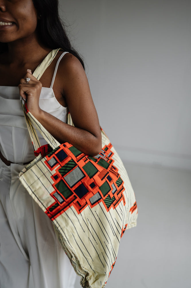 
                      
                        Cream and Orange Tote
                      
                    